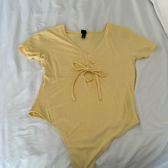 wild fable Tops - Yellow short sleeve body suit, front cut out